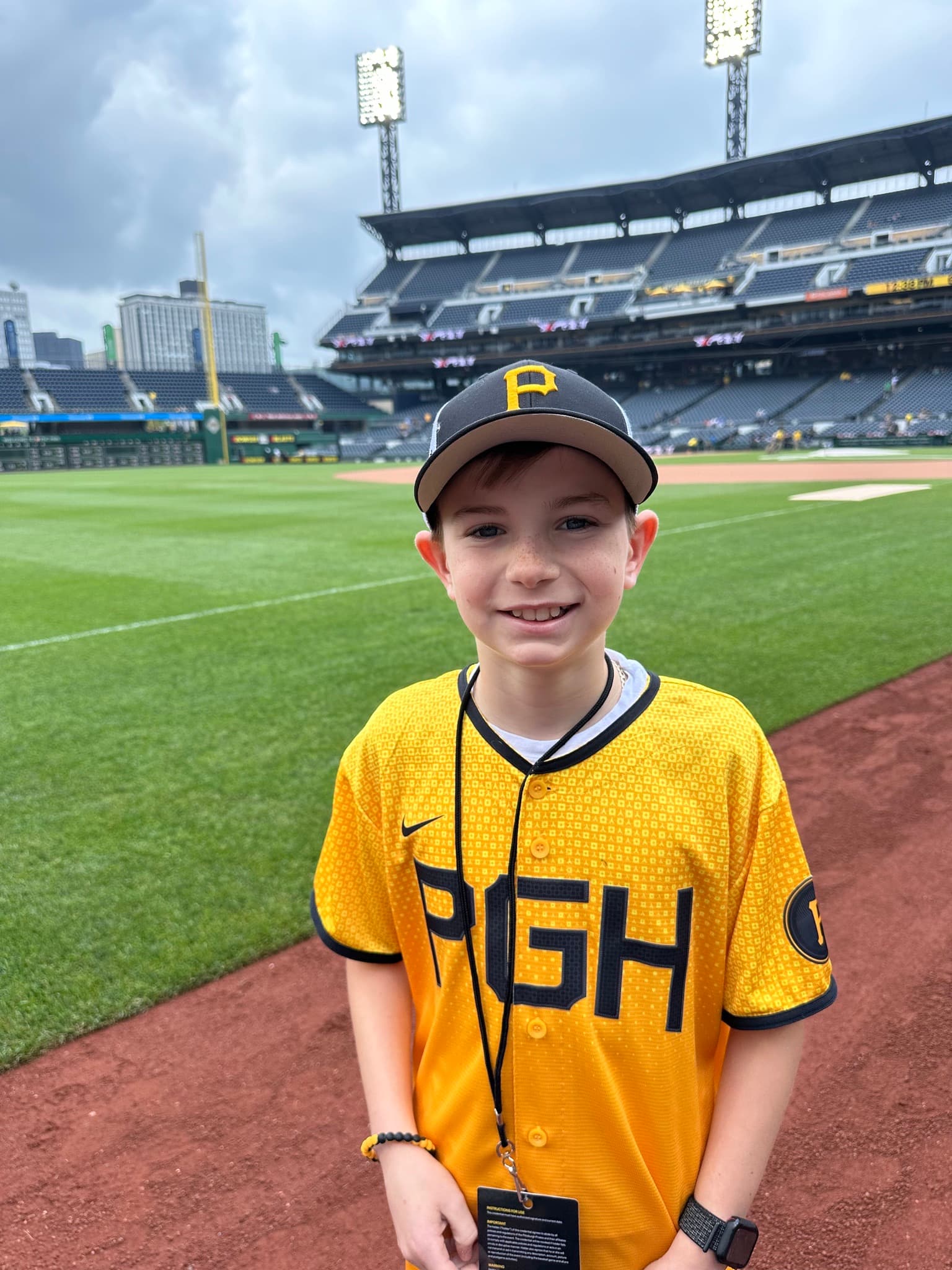 Bryson in a Pittsburgh Pirates jersey on the field at PNC Park