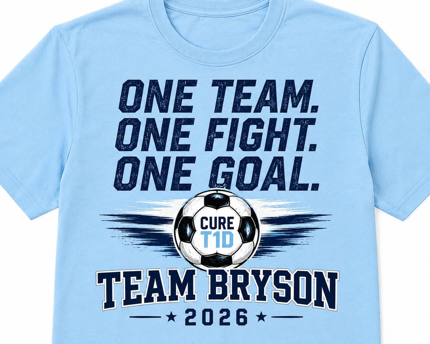 2026 Team Bryson walk shirt in light blue: “One Team. One Fight. One Goal.” above a soccer ball reading Cure T1D, over “Team Bryson 2026”
